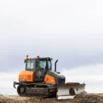 Nuovo dozer Develon per livellamenti di precisione